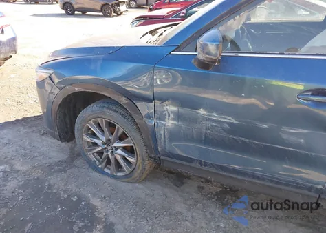 2021 Mazda Cx-5 Grand Touring z USA, uszkodzony, nr VIN JM3KFBDM2M0430626